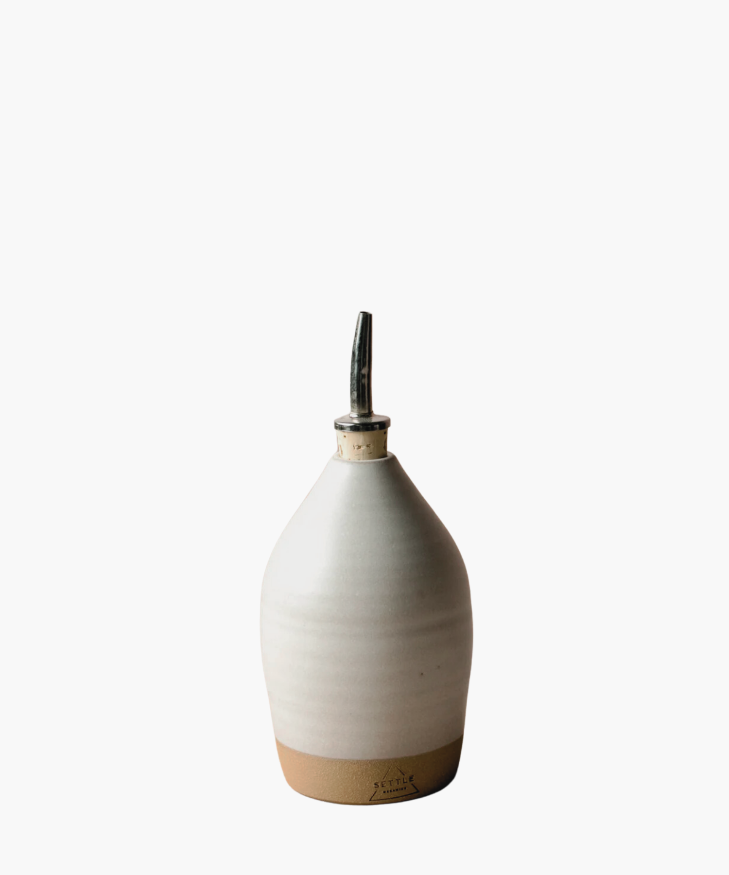14oz ceramic bottle with an off white matte finish, topped with a metal spout. It conveys a minimalist and elegant tone. | S.W. Home