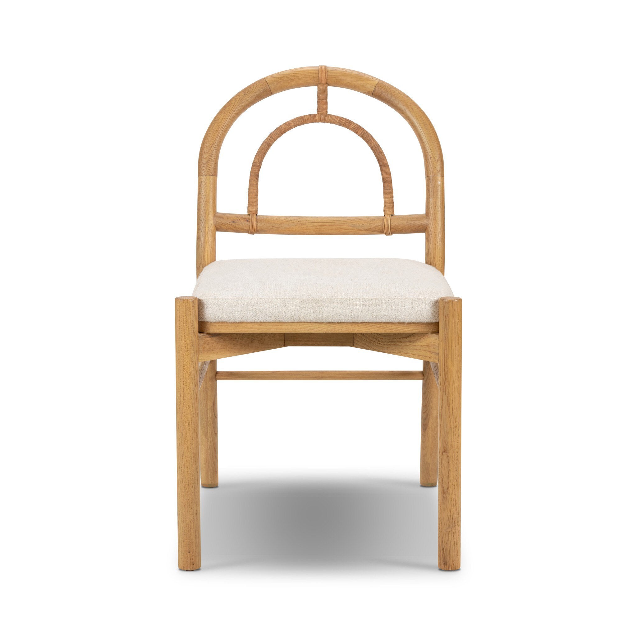 Solid oak dining chair with an arched frame, hand-wrapped cane back detailing, and an upholstered drop-in seat. | S.W. Home