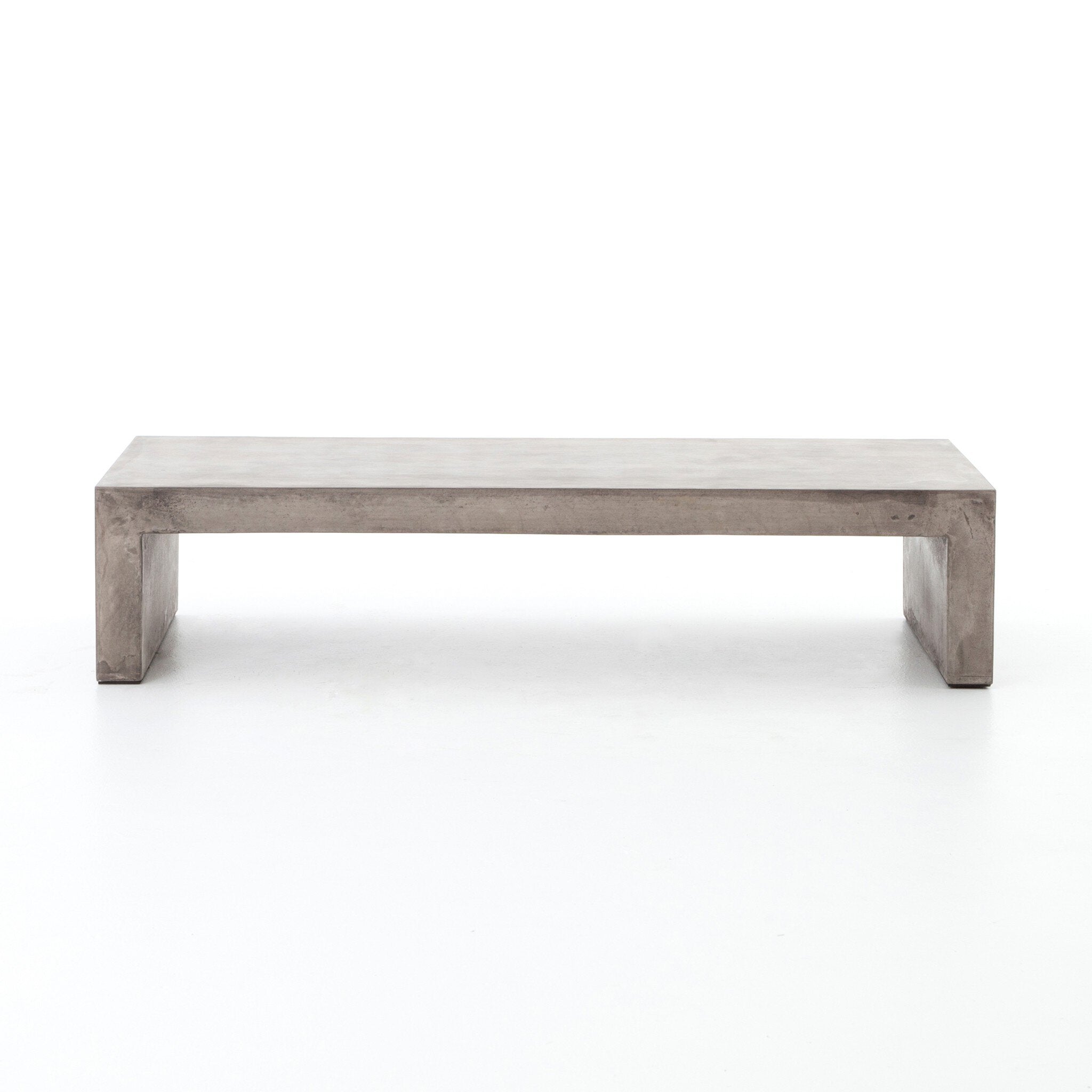 Dark grey concrete waterfall coffee table on a white background.  | S.W. Home
