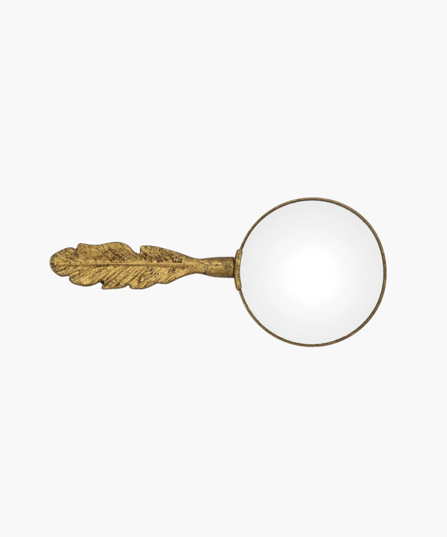 Vintage inspired magnifying glass with a distinct ornate handle shaped like a textured gold leaf or feather. The glass lens is clear, creating an elegant, antique feel. | SW Home