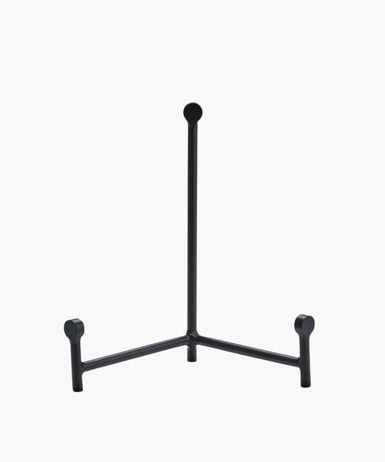Minimalist black metal easel stand with three legs and a vertical support. The stand is sleek and modern in design. | SW Home