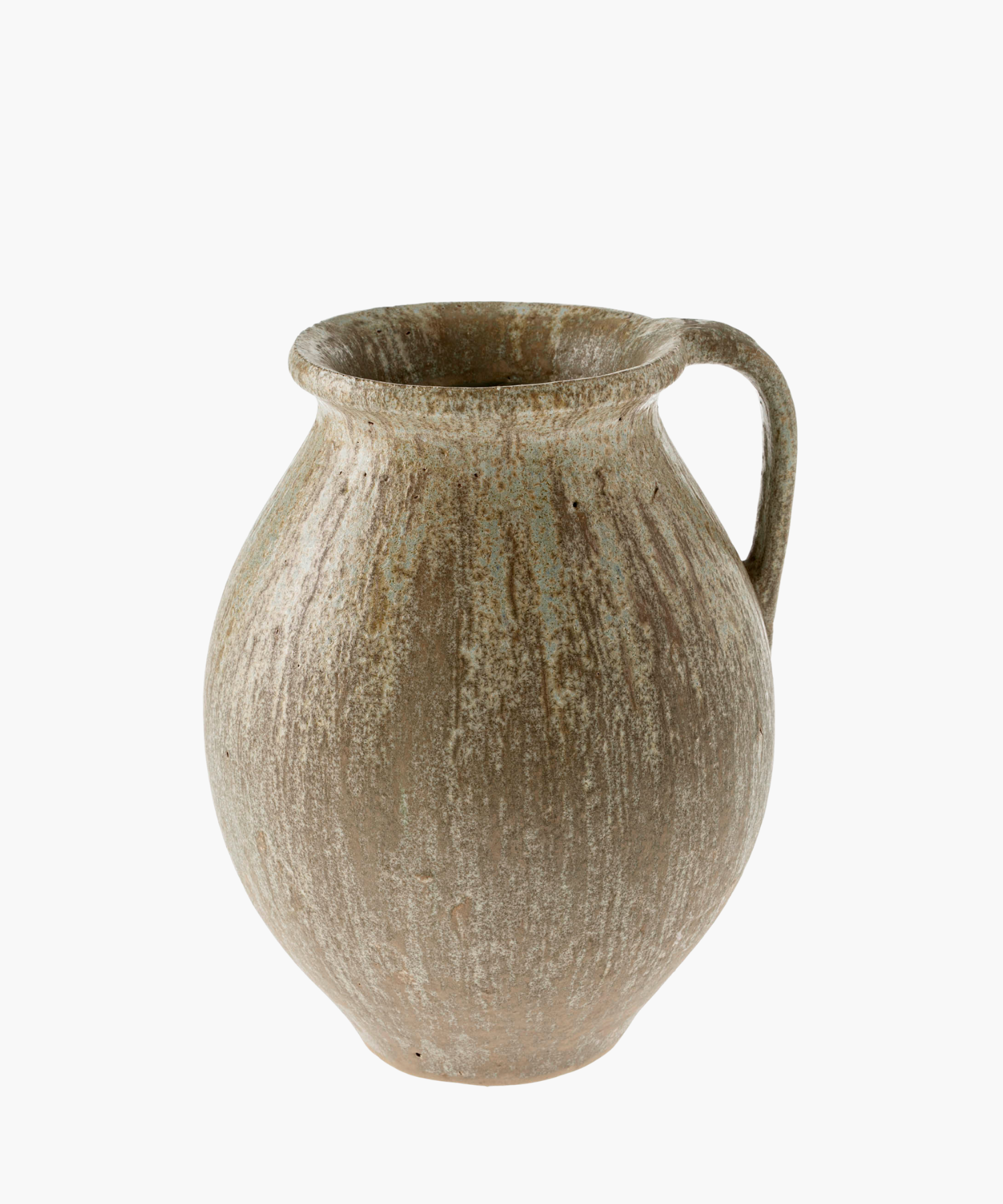 A rustic, earth-toned ceramic jug with a rounded body and a single handle on the side. The surface has a textured, weathered appearance. | S.W. Home