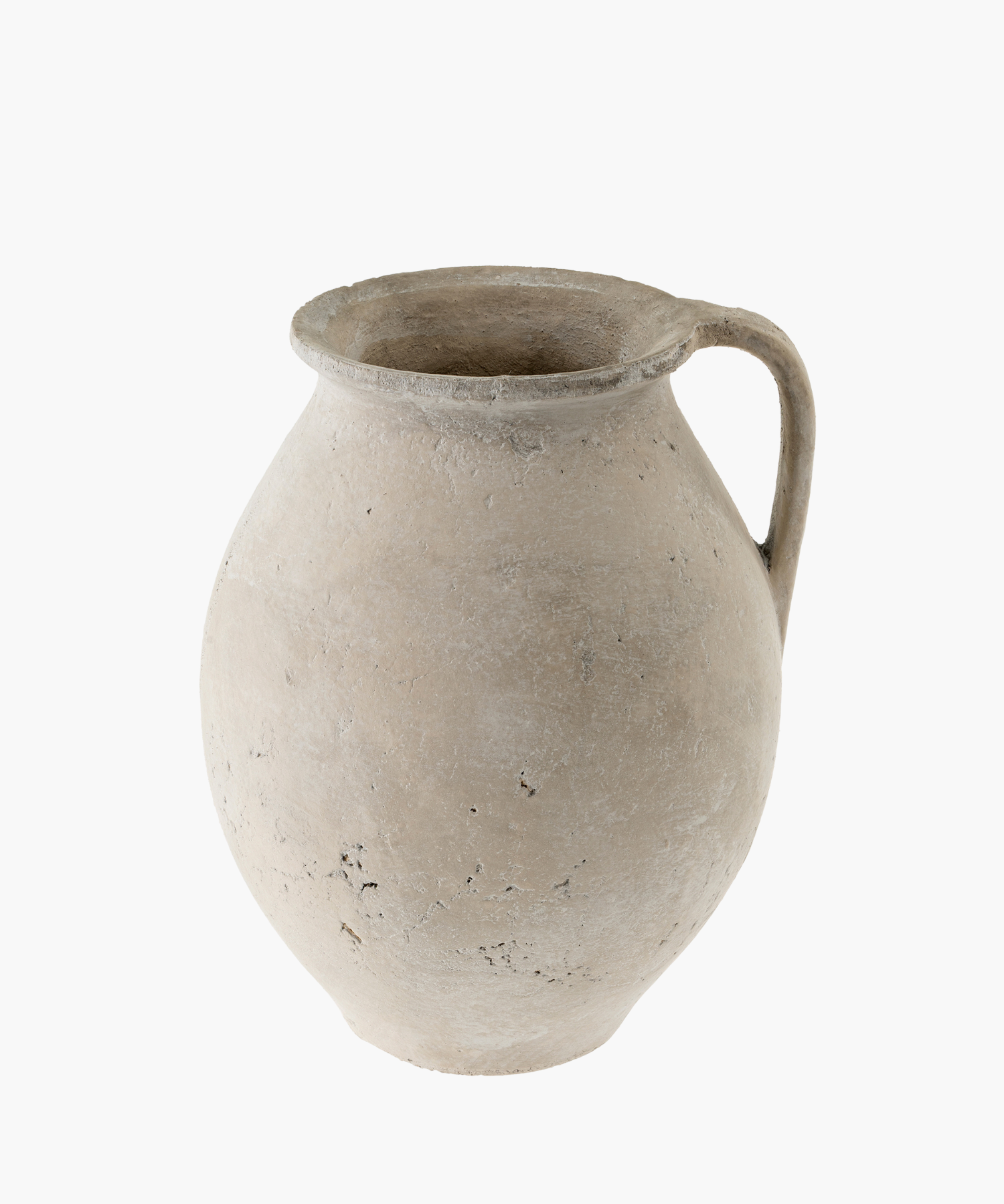 A weathered, ancient clay pot with a single handle is shown. Its surface is rough and textured, suggesting age and history. The tone is earthy and rustic. | Wildwood Home Co.
