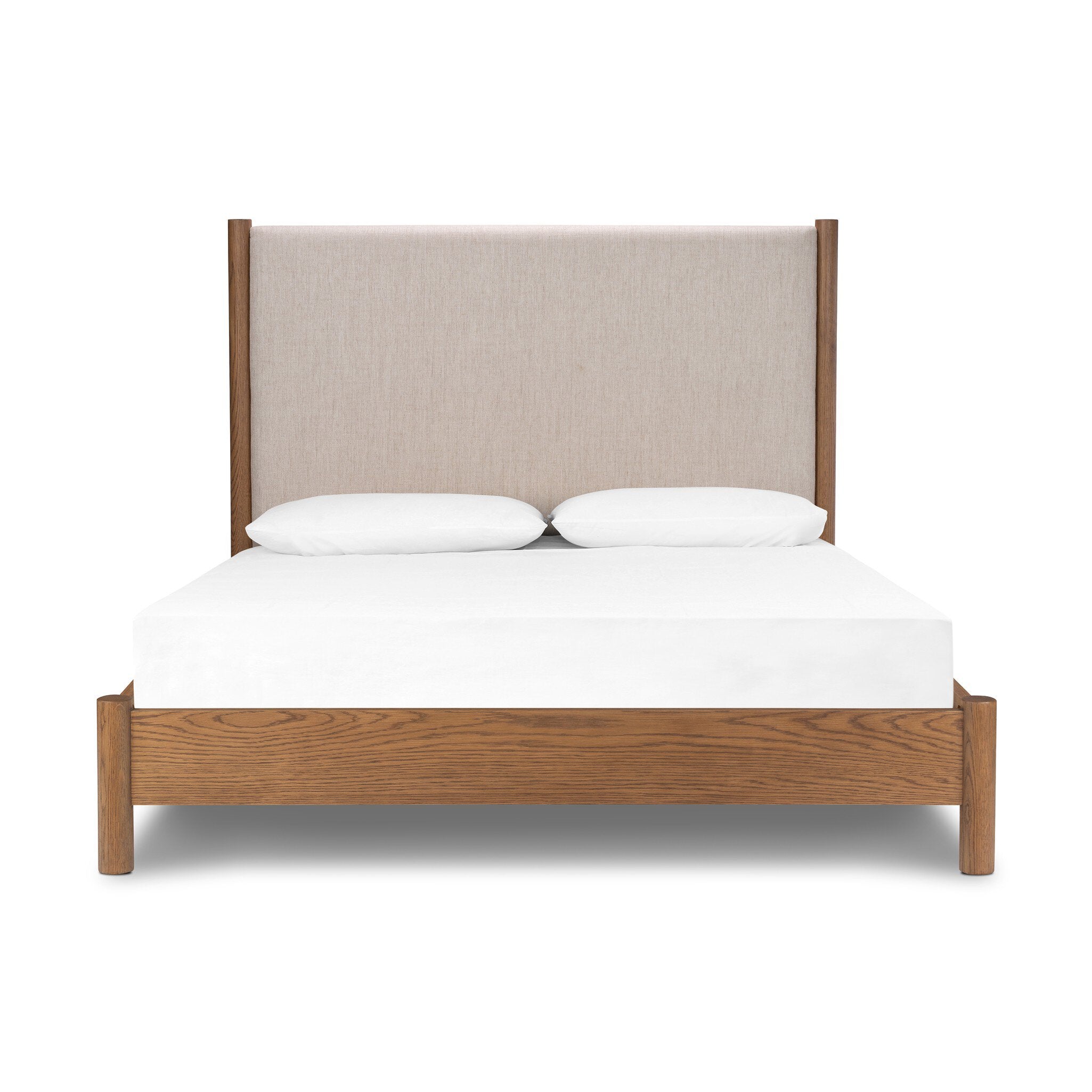 Wooden bed with upholstered headboard and white bedding on a white background. | SW Home