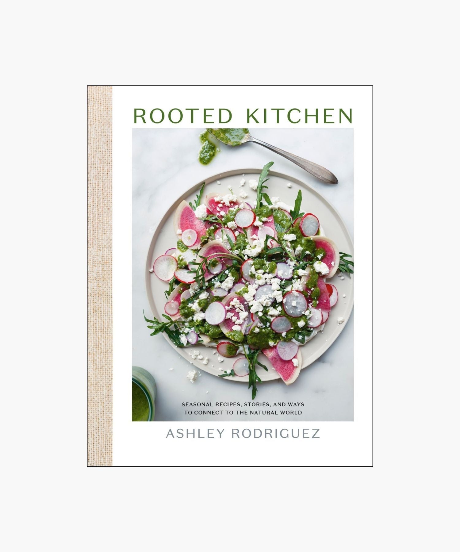 The cover of the book "Rooted Kitchen" by Ashley Rodriguez features a vibrant salad with radishes, arugula, and feta. It conveys freshness and culinary creativity. | S.W. Home