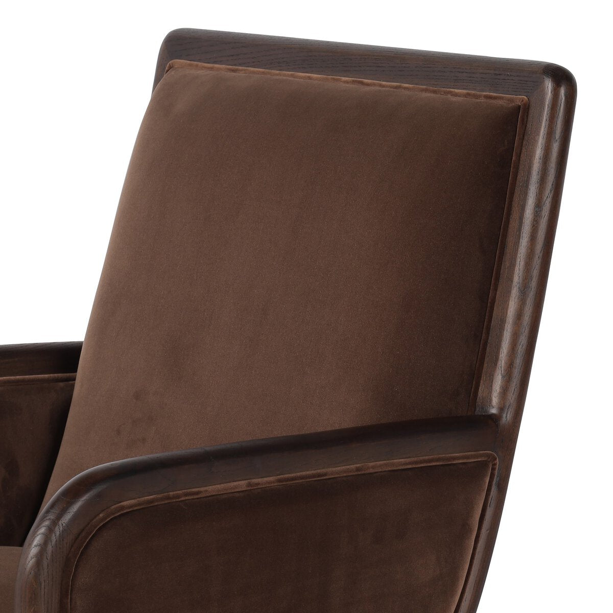 Close up of a brown office chair with a chrome base on a white background.