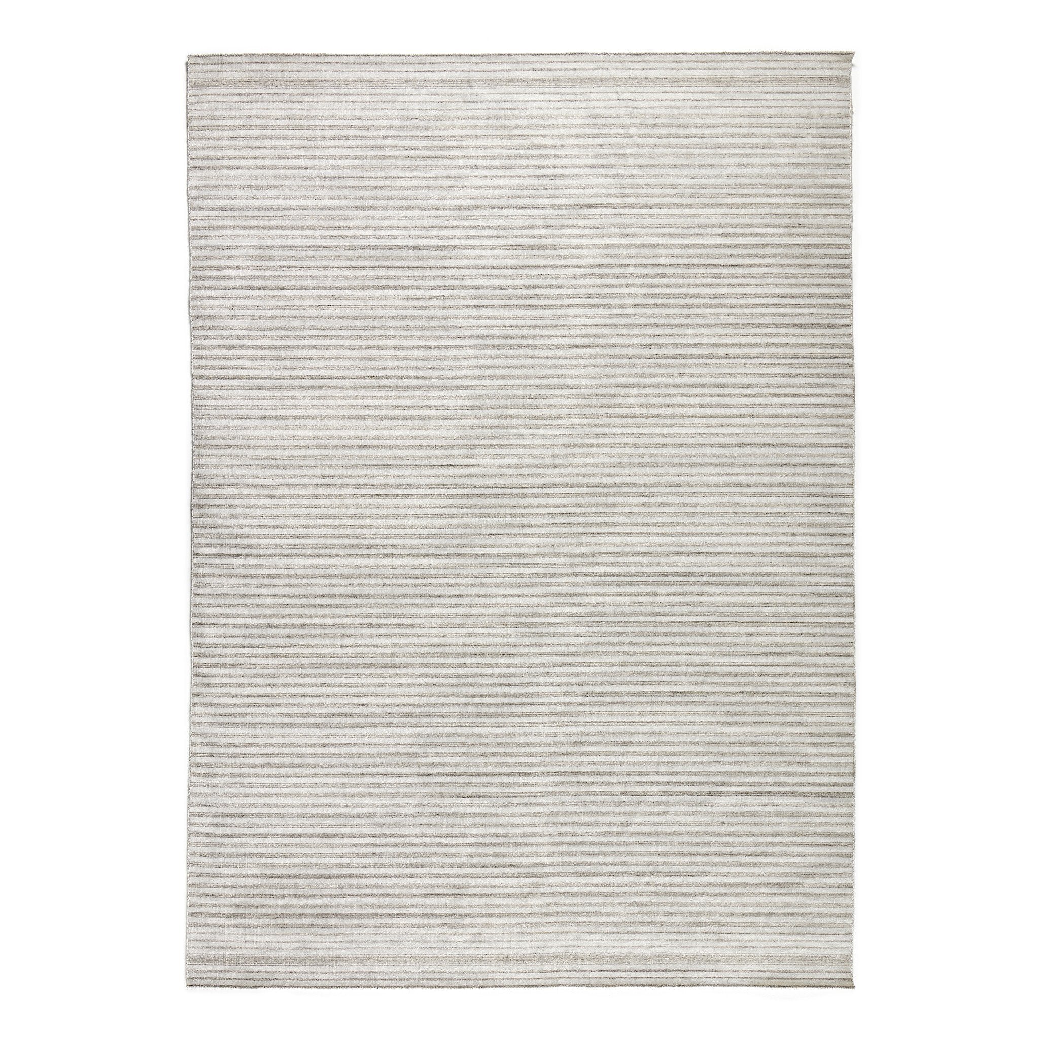 Rectangular outdoor rug with a striped pattern on a white background. | SW Home