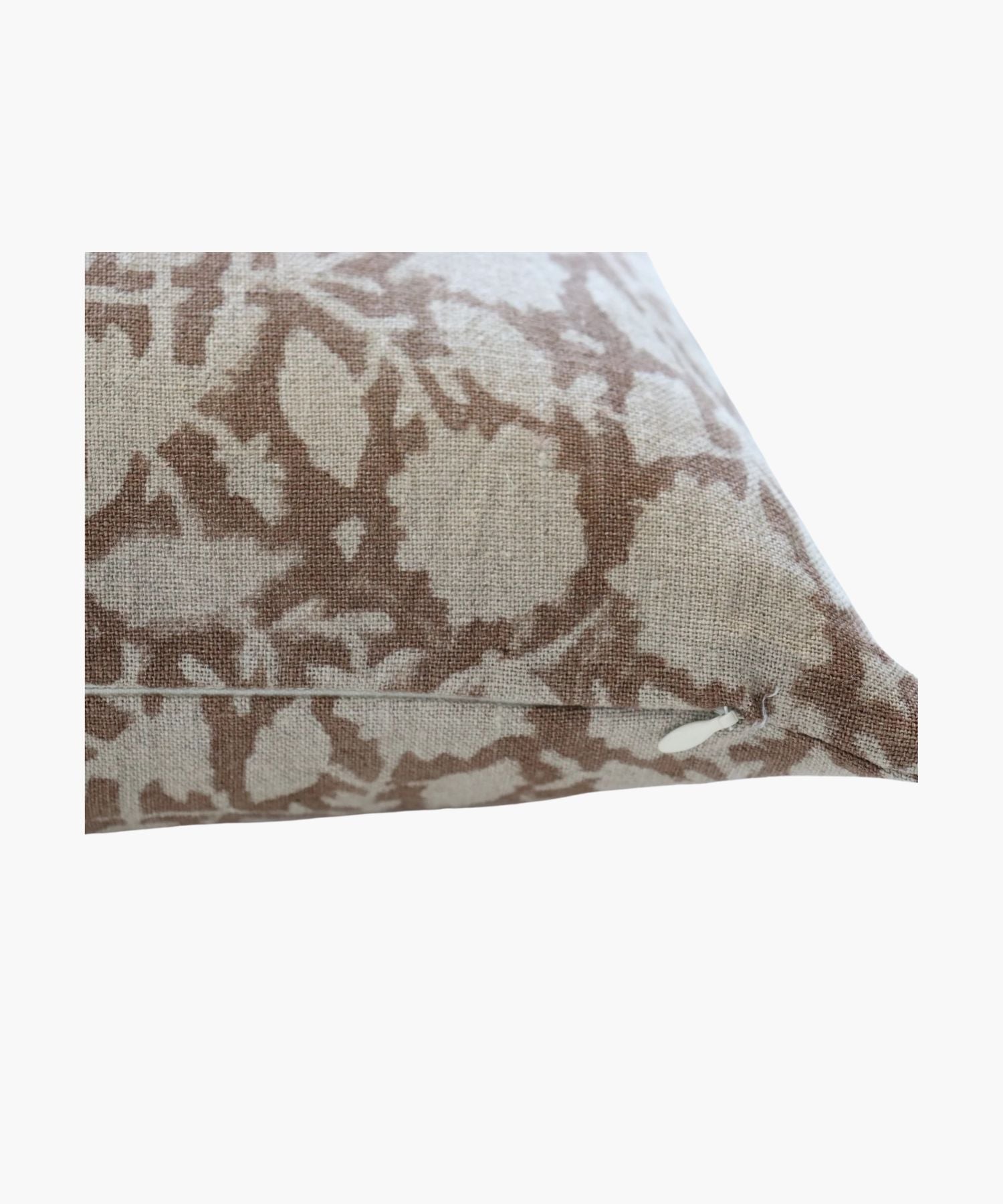 A square pillow cover with a beige and brown floral pattern, featuring delicate vines and round blossoms. The fabric texture adds a cozy, elegant feel. 