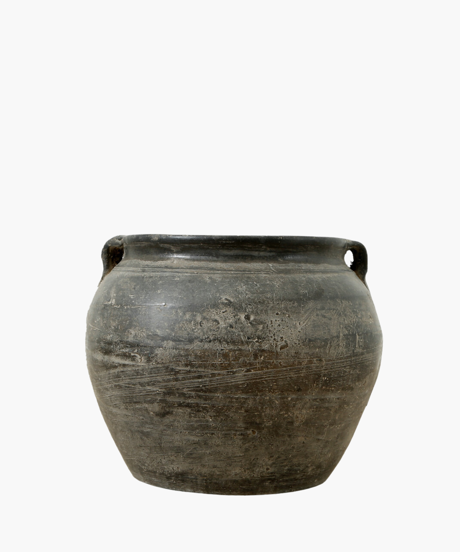 A rustic, vintage inspired round ceramic pot with a dark finish pot and small handles on each side. It conveys a sense of antiquity and simplicity. | S.W. Home