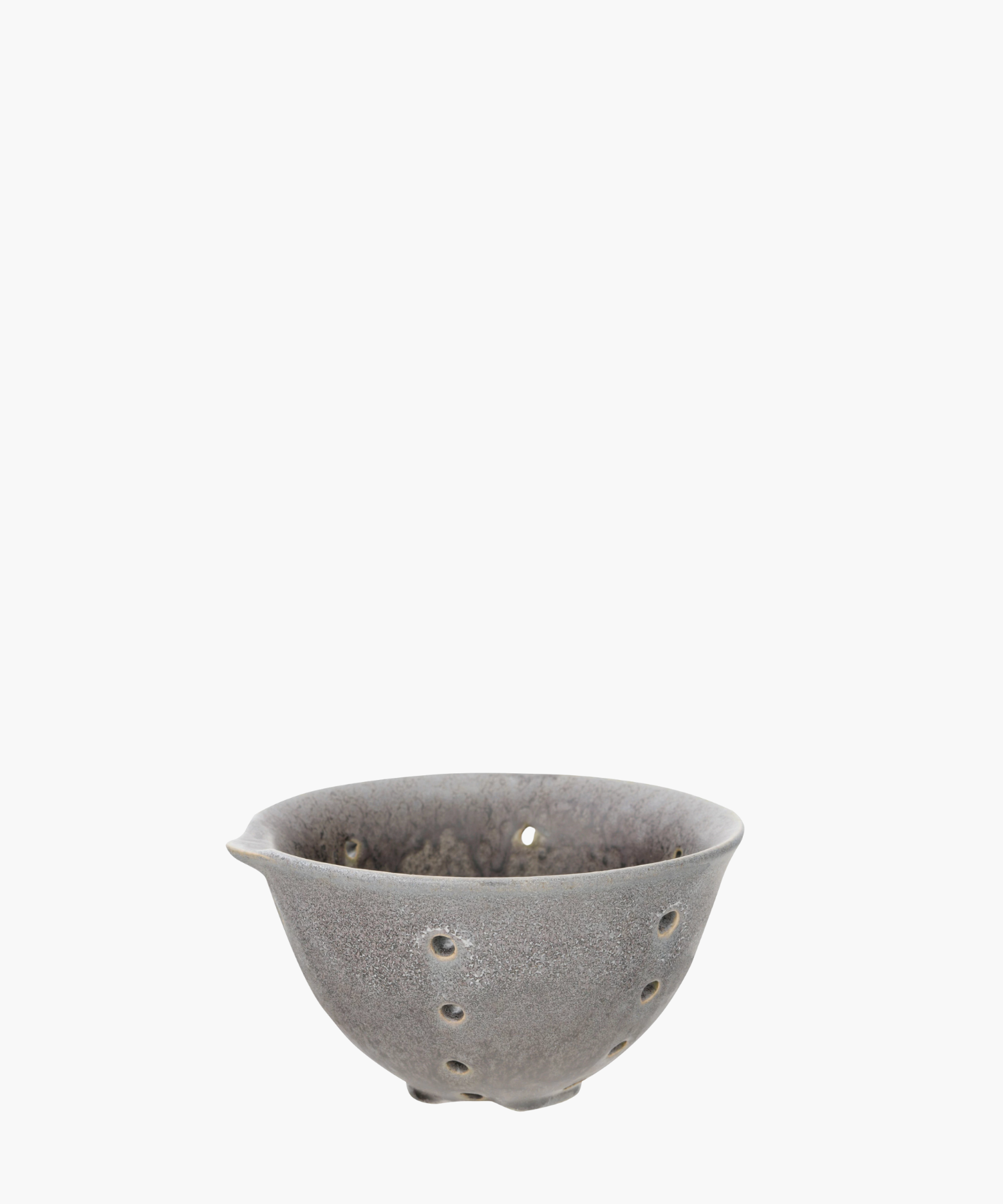 A ceramic bowl with small holes. The bowl is a textured gray. Simple and artistic. | S.W. Home