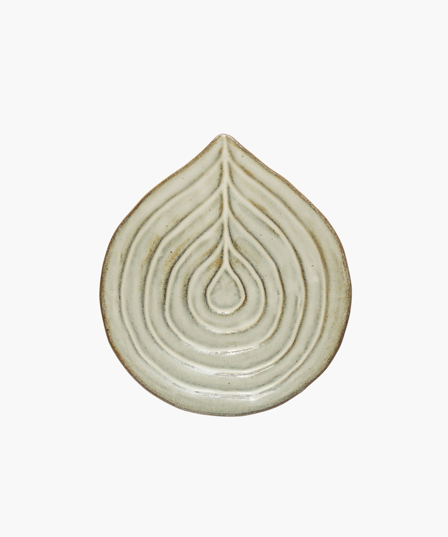 Embossed stoneware dish or spoon rest with reactive glaze. | S.W. Home