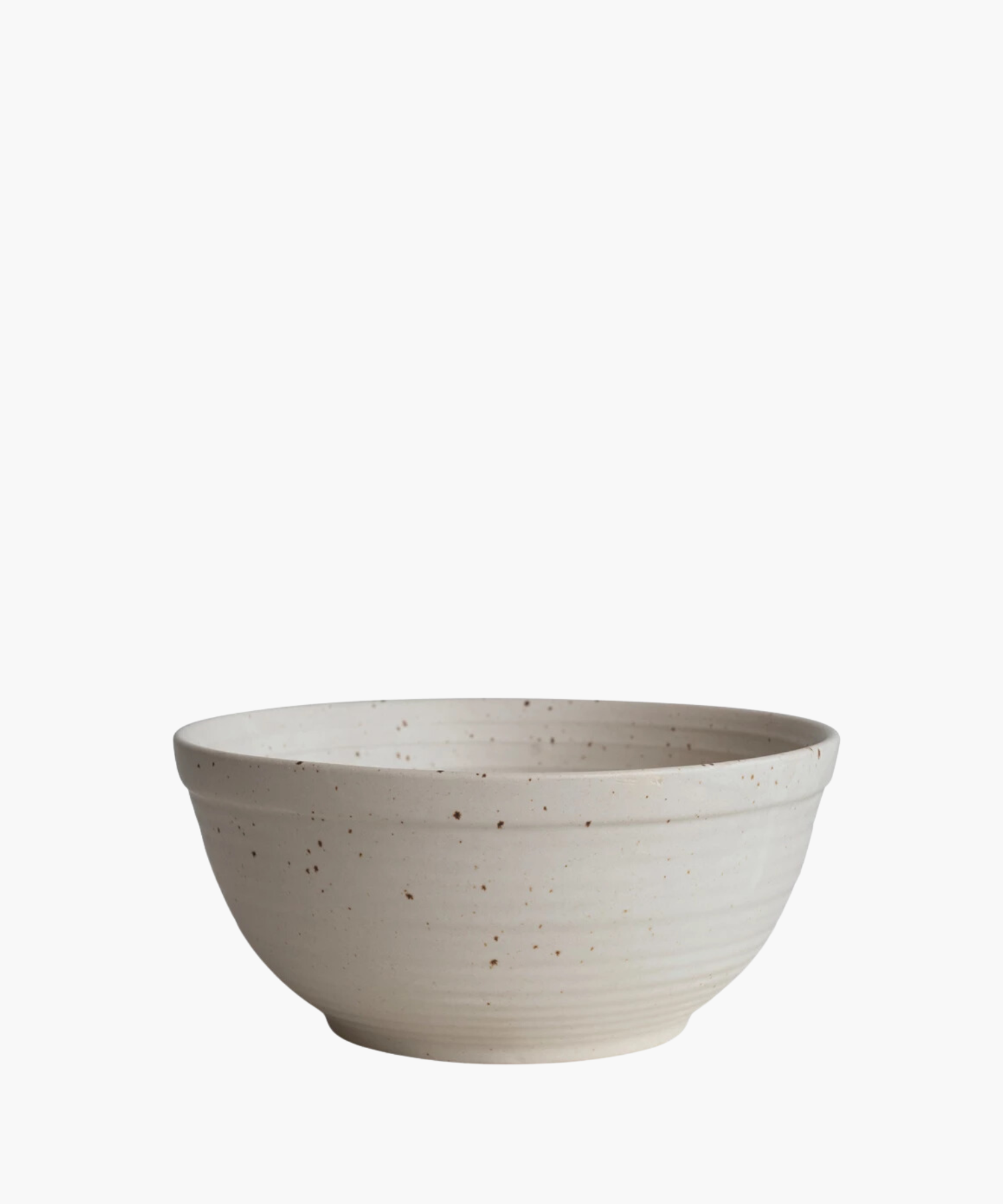 A beige ceramic bowl with a speckled pattern and a smooth, rounded shape. The bowl's minimalistic design conveys a rustic, handcrafted aesthetic. | S.W. Home