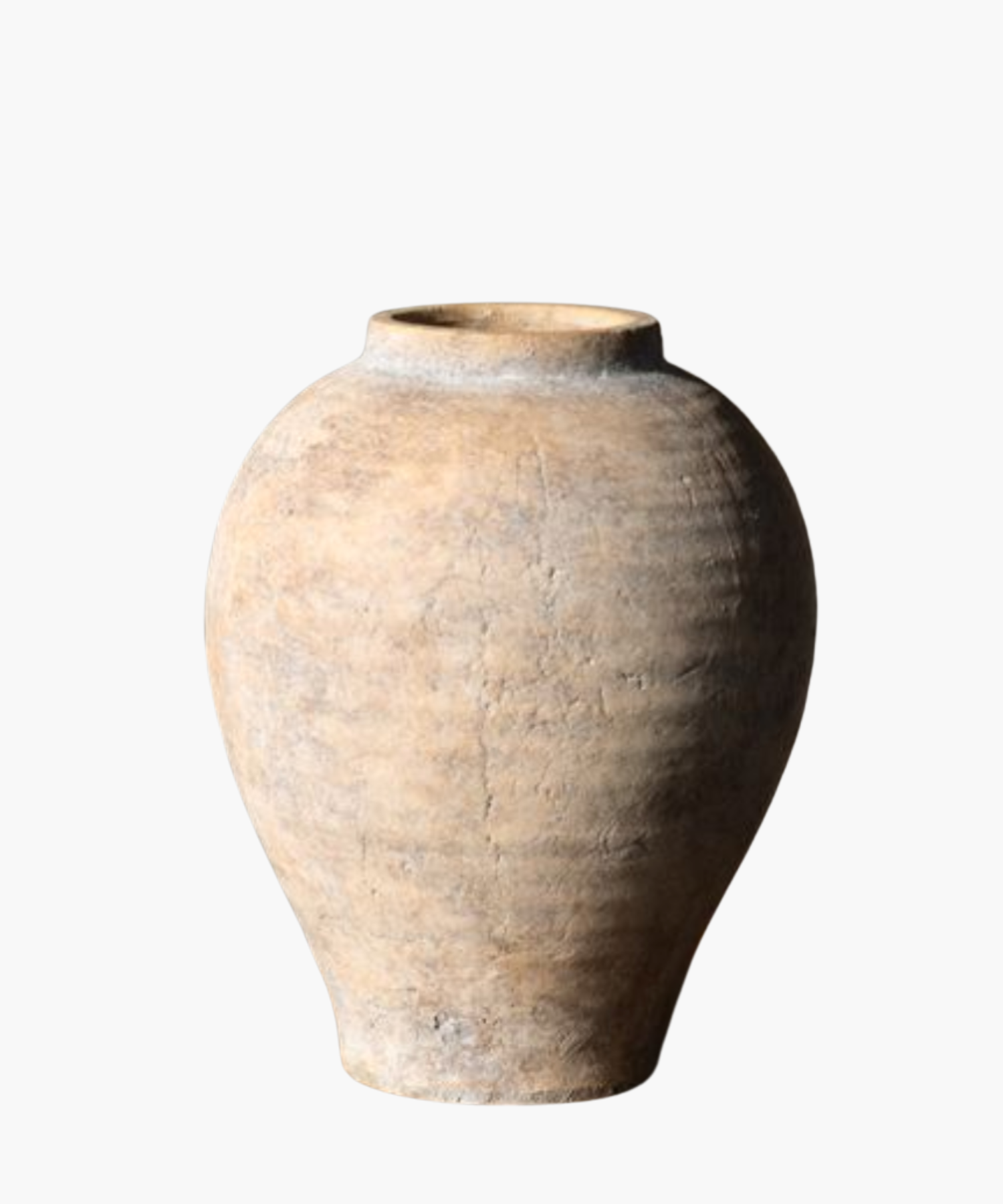 Antique clay vase with an earthy texture and rounded shape, showing signs of aging. The surface has a rustic, weathered appearance. | S.W. Home