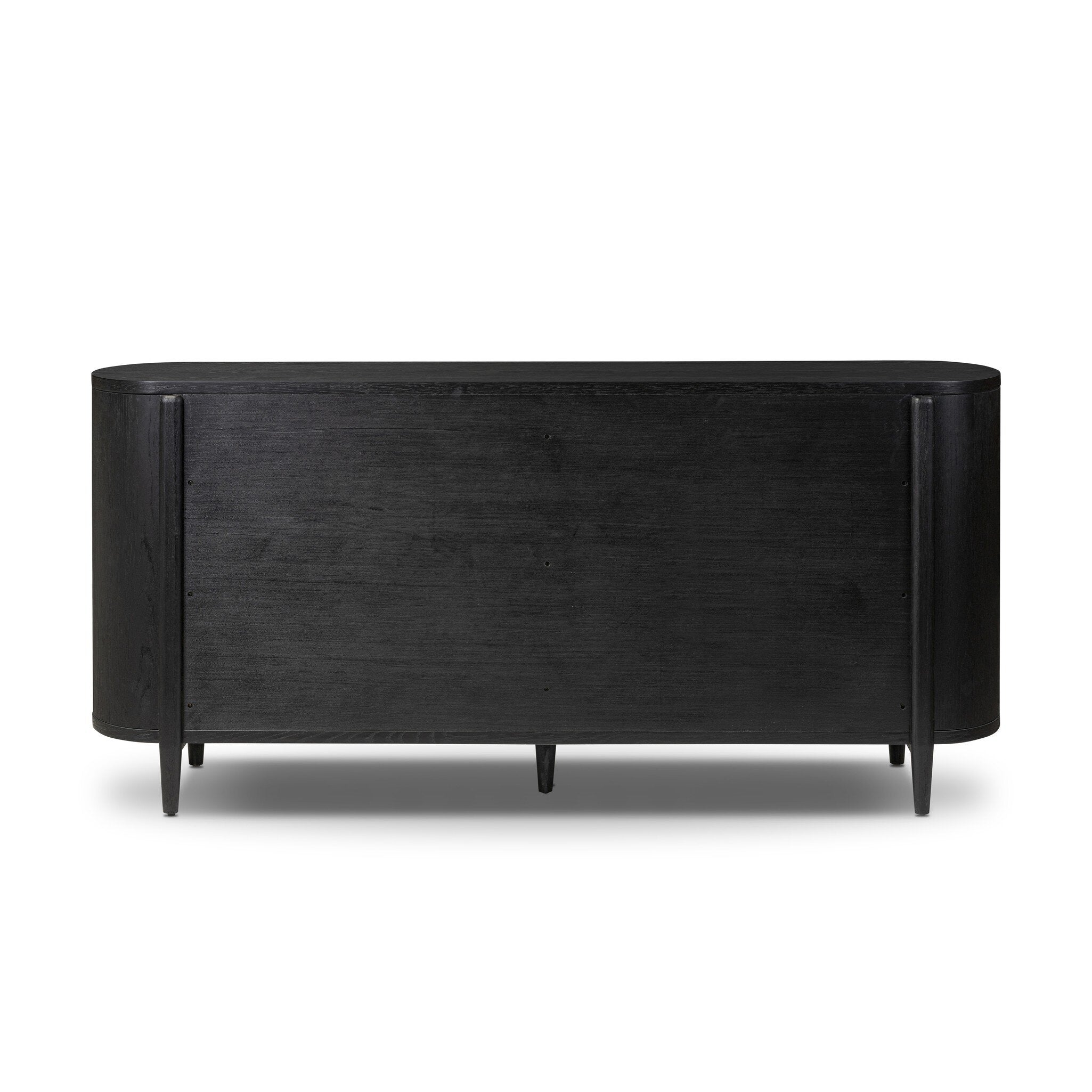 The back of a curved black dresser with brass handles on a white background.