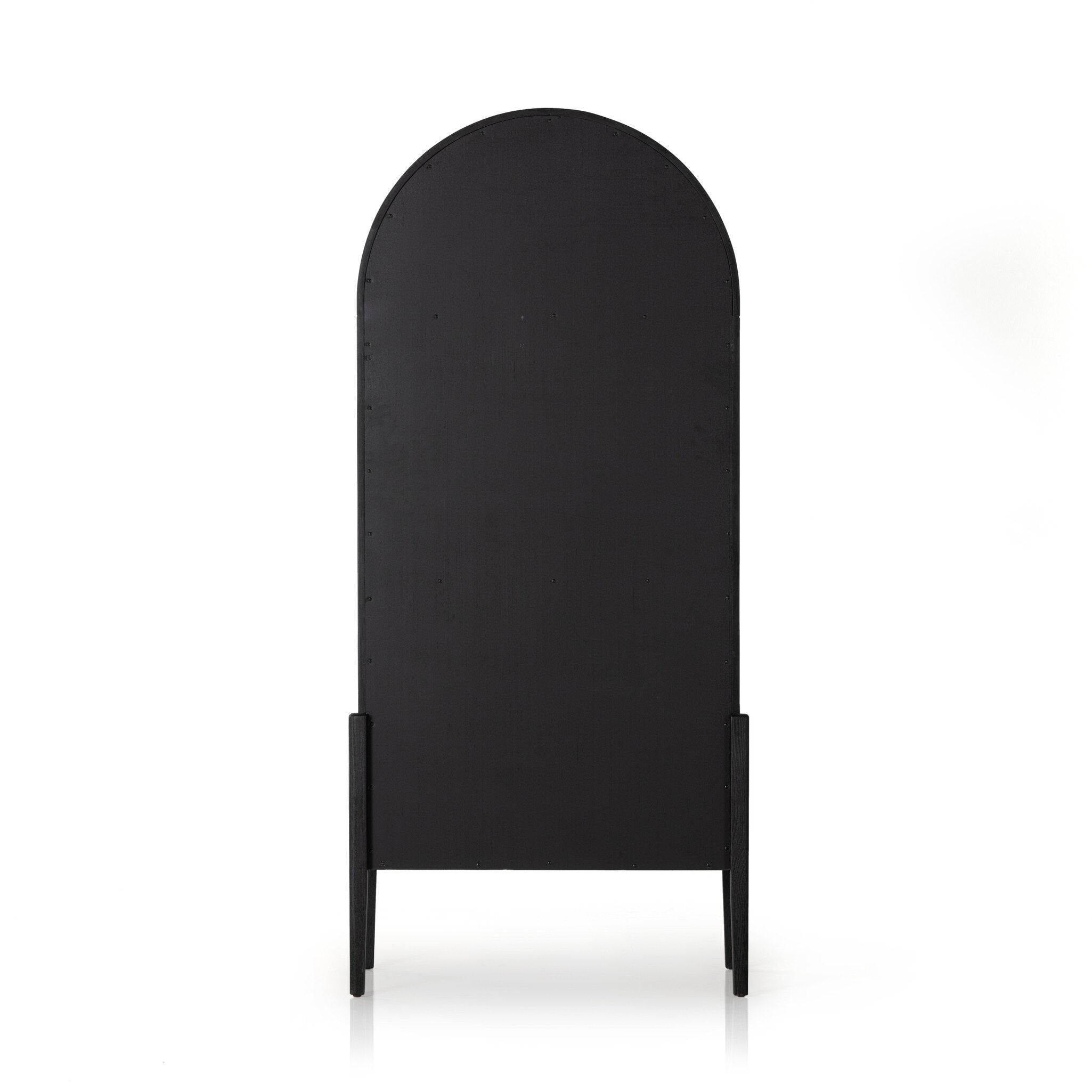 The back of a black-finished solid oak cabinet with an arched top and glass doors.