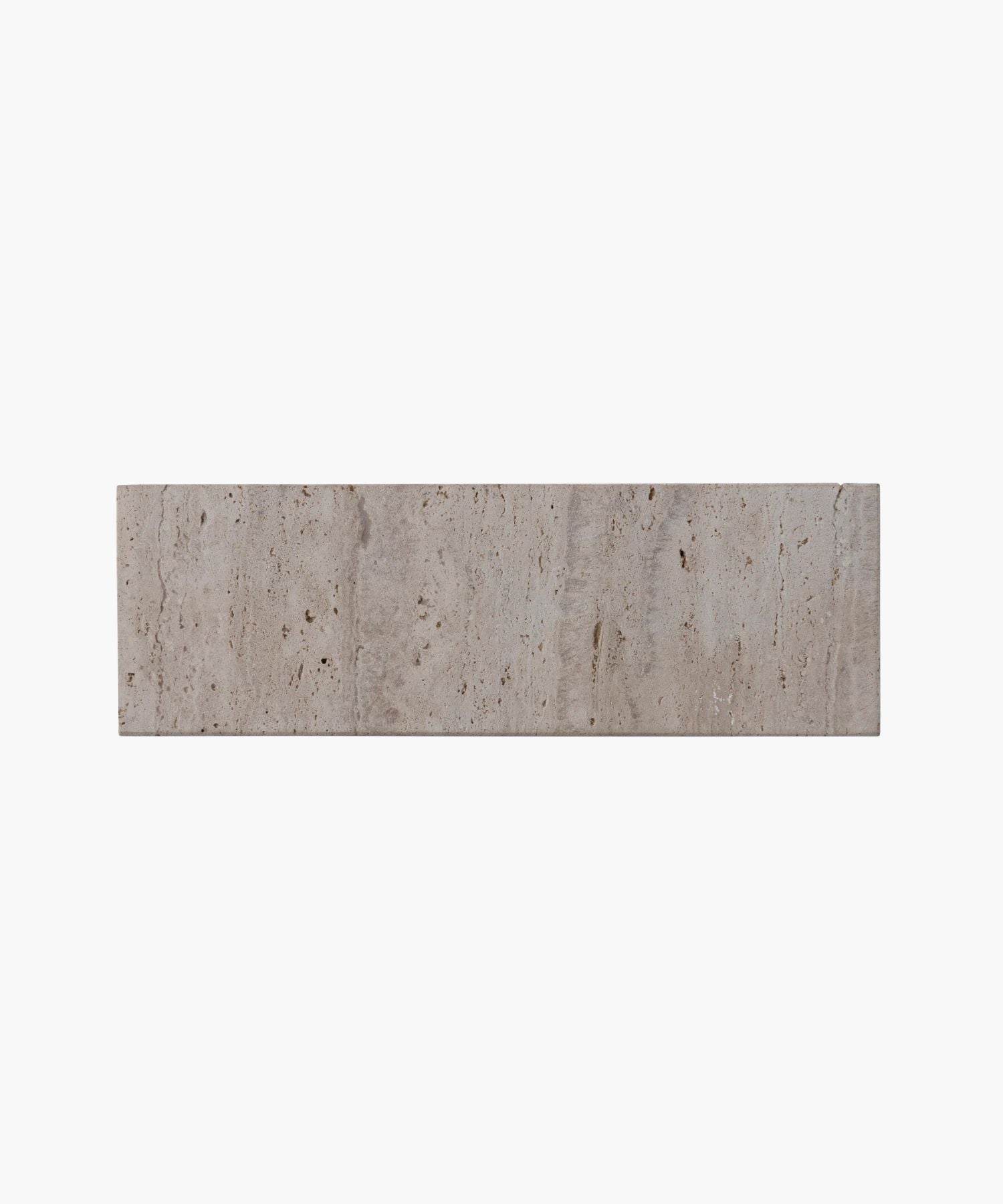 An overhead picture of a rectangular travertine tray highlighting its with a smooth, beige surface. The minimalist design gives a clean, modern aesthetic. | SW Home
