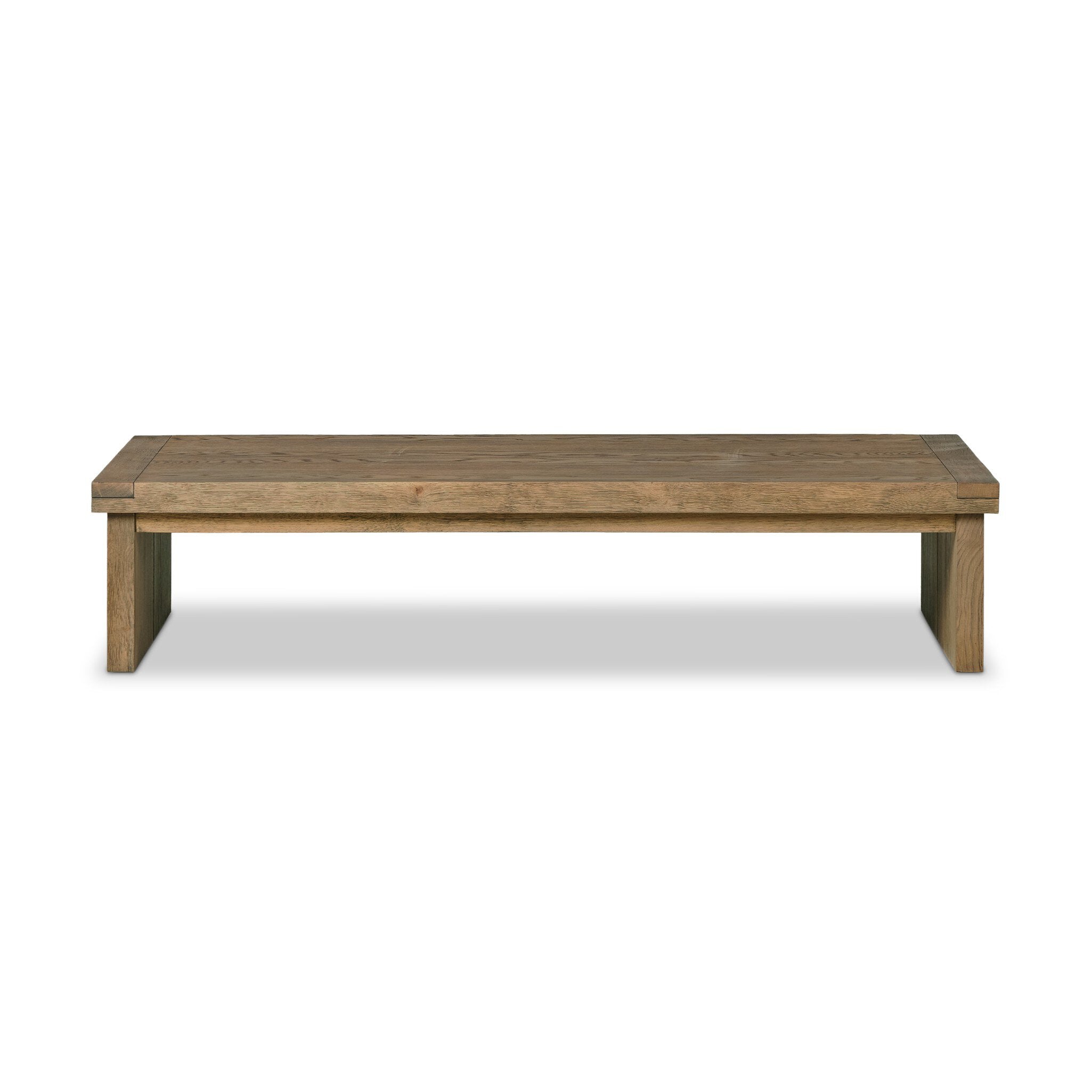 An oak coffee table on a white background.| S.W. Home