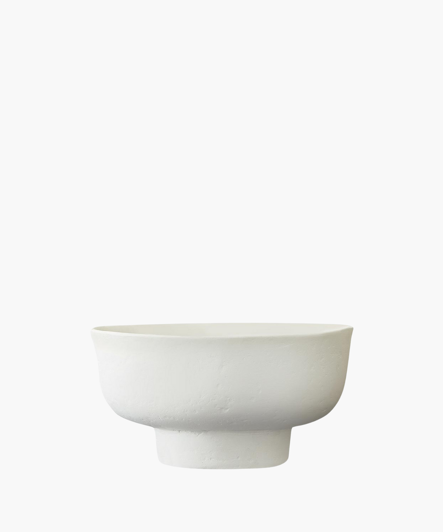 A minimalist white ceramic bowl with a smooth texture and wide rim, set against a plain background. It conveys simplicity and elegance. | SW Home
