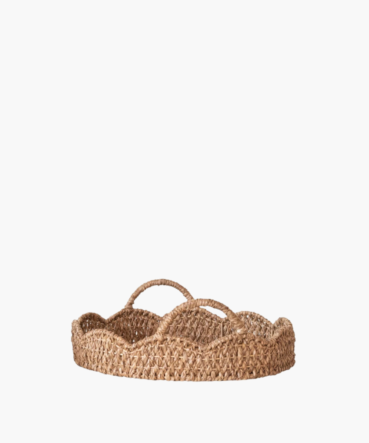 A woven, round basket with a scalloped edge and two looped handles. Made of natural fibers, it evokes a rustic and earthy aesthetic. | SW Home