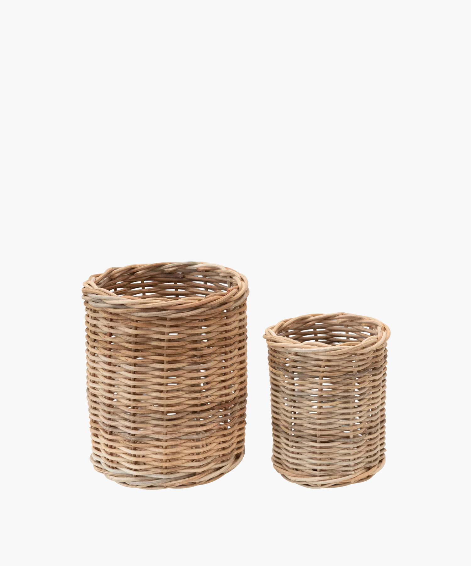 Two round wicker basket containers are shown against a white background. The larger basket is on the left, and a smaller one is on the right. Both have a natural, rustic appearance. | S.W. Home